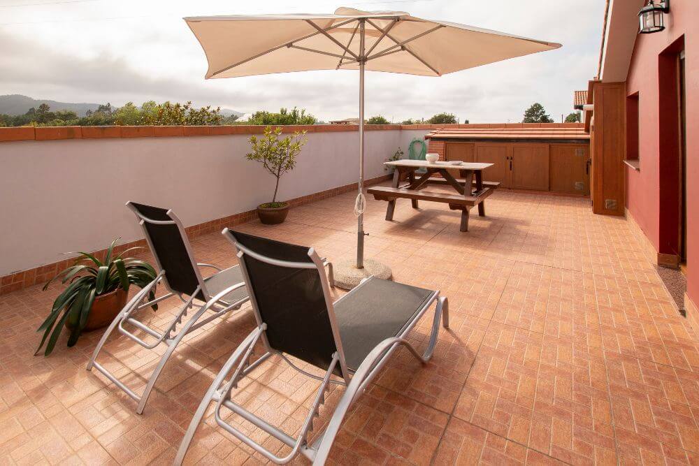 Terraza El Desván - Café Apartamentos Hotel en Oviñana, Cudillero.